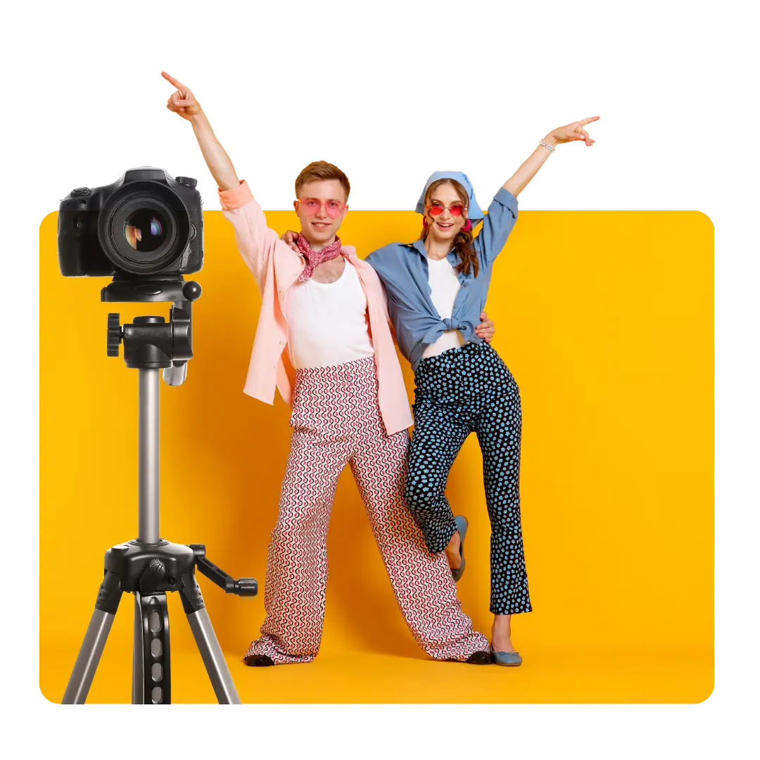 Couple qui danse devant une caméra sur trépied
